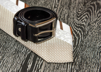 black leather belt and ties