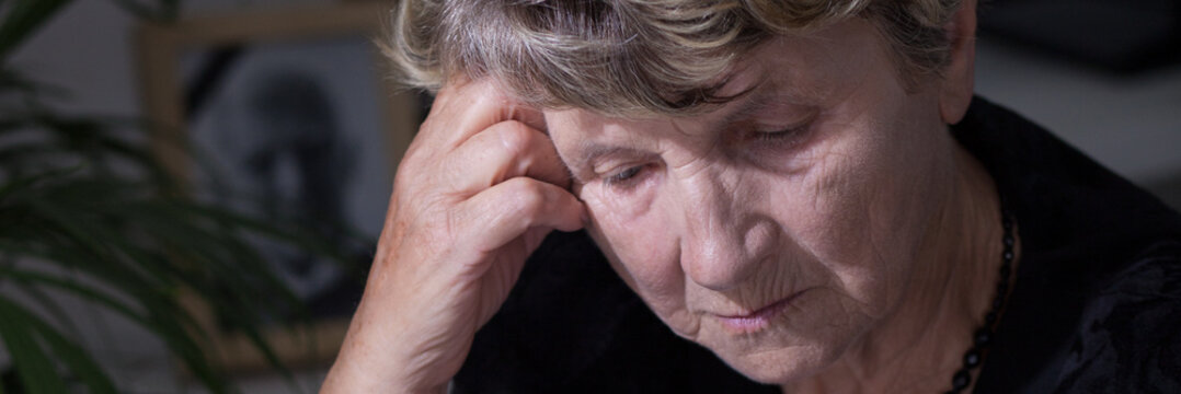 Close-up on distraught widow