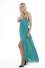 Beautiful blonde woman in flying dress