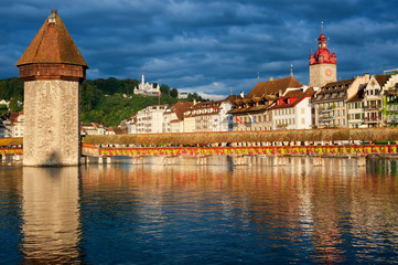 Obraz premium Lucerne, Switzerland, view over the old town with Chapel Bridge, Water tower and Gutsch palace