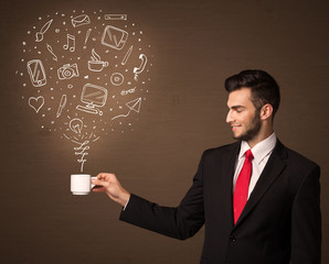 Businessman holding a white cup with social media icons