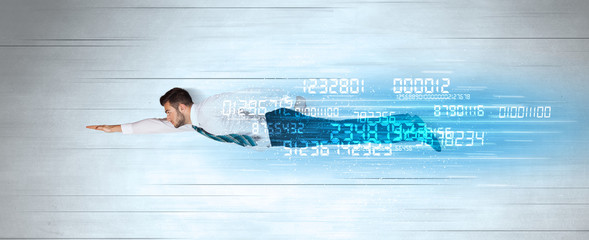 Businessman flying super fast with data numbers left behind