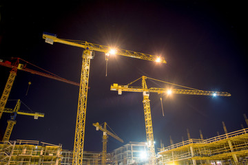 cranes and illumination at night