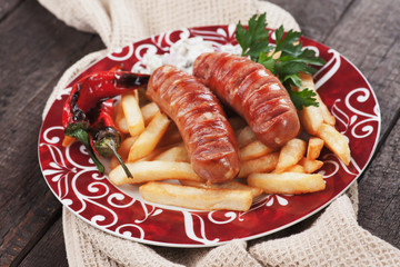 Grilled sausages with french fries