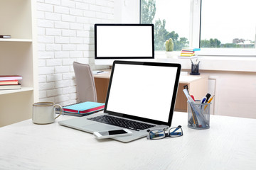 Workplace with computer in office