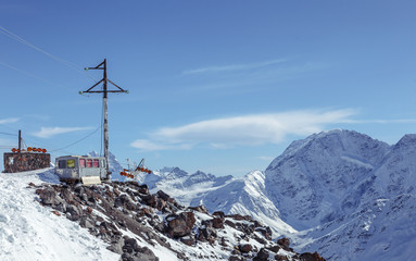Fototapeta na wymiar The house over the mountains at Elbrus shoulder