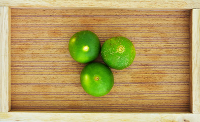 green lime in the wood box
