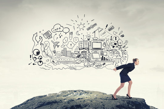 Businesswoman carrying out idea