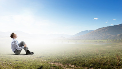 Businessman in summer park