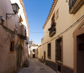 Old street in european city. Chinchilla de Monte-Aragon
