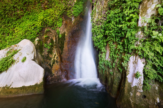  Waterfall in rocky grot