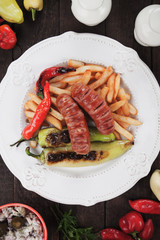 Grilled sausages and french fries