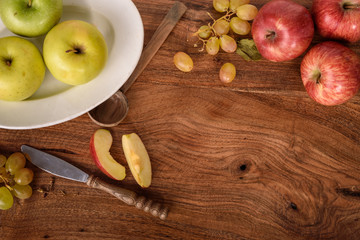 Apples and Grapes on Rustic Tabletop