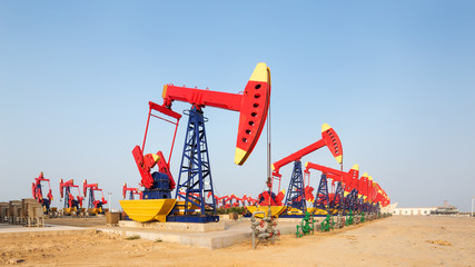 view of oilfield with pump units running