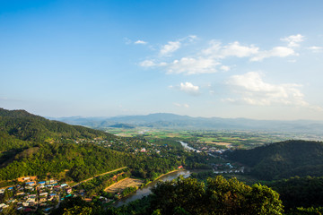 Obraz premium Landscape of mountains and countryside.