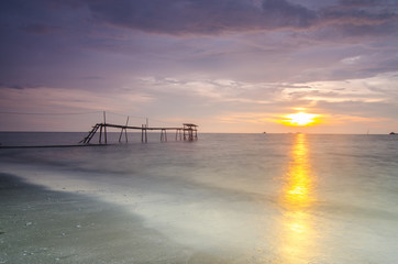 Silhouette of fisherman jetty during sunrise