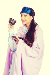 Morning woman wrapped in coverlet.