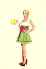 Beautiful bavarian woman with beer.