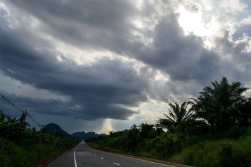 Storm Clouds and road