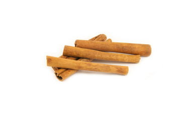 Cinnamon sticks on white background
