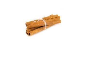 Cinnamon sticks on white background