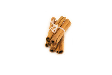 Cinnamon sticks on white background