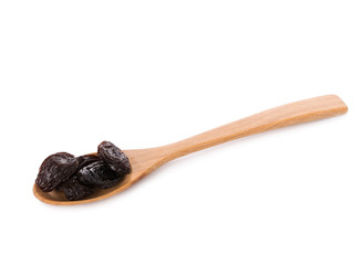 Dried raisins on white background