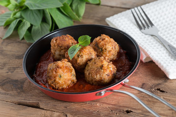 Homemade, Meatball with tomato sauce in pan. Selective focus.