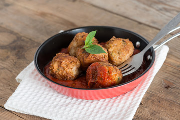 Homemade, Meatball with tomato sauce in pan. Selective focus.