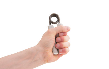 Male hand exercising grip strength using a metal hand gripper