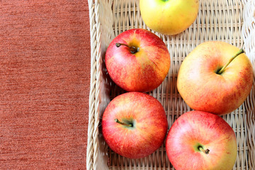 Fresh harvest of apples  on wooden background. Nature fruit concept
