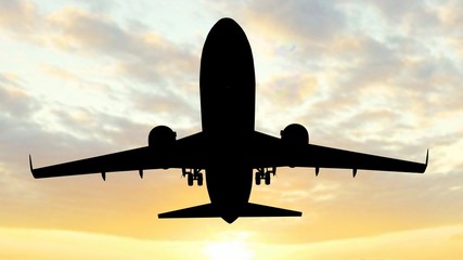 Modern Passenger airplane silhouette flight in sunset