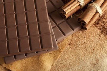 Chocolate bars and cinnamon sticks