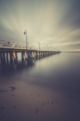 Gdynia Orlowo pier. Vintage photo of Baltic sea shore seascape.