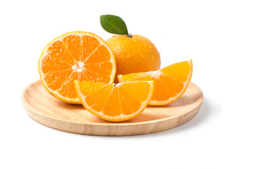 fresh slice orange fruit isolated on wood plate