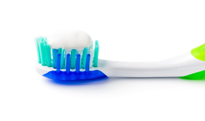 toothpaste on toothbrush