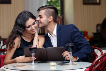 young couple flirting at the restaurant