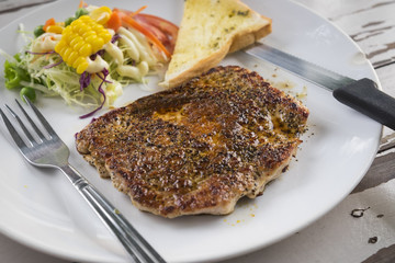 Pork steak with black pepper