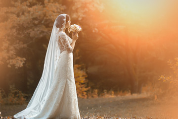 Young bride in forest