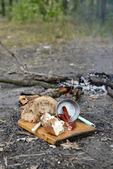 Grilled sausages on cutting board in the wood