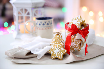 Christmas cookies and cup of tea, on table at home