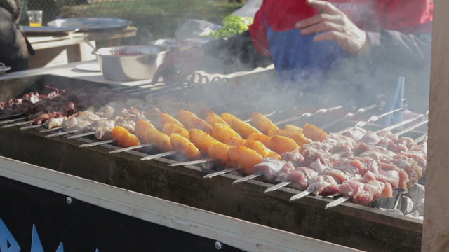 Meats and vegetables barbecue, grilled on open fire
