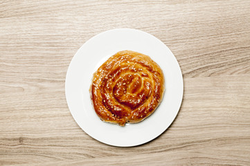 Bun with sesame on the plate