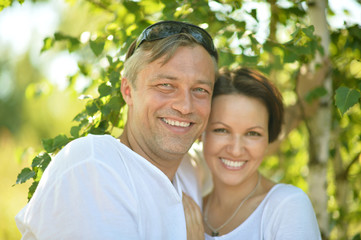Obraz premium couple in summer park