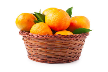 organic ripe mandarins in basket on white background