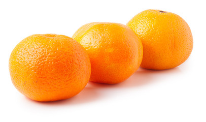 Three ripe mandarins isolated on white background