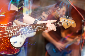 Obraz na płótnie Canvas aggressive play guitar on stage