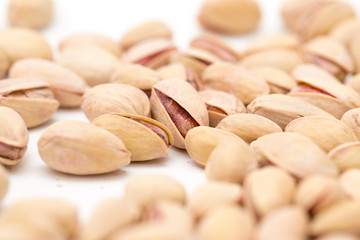 pistachios on a white background. close