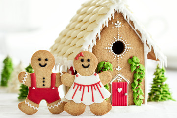 Gingerbread house with gingerbread couple