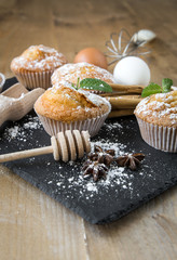 Homemade muffins with star anise, cinnamon and mint